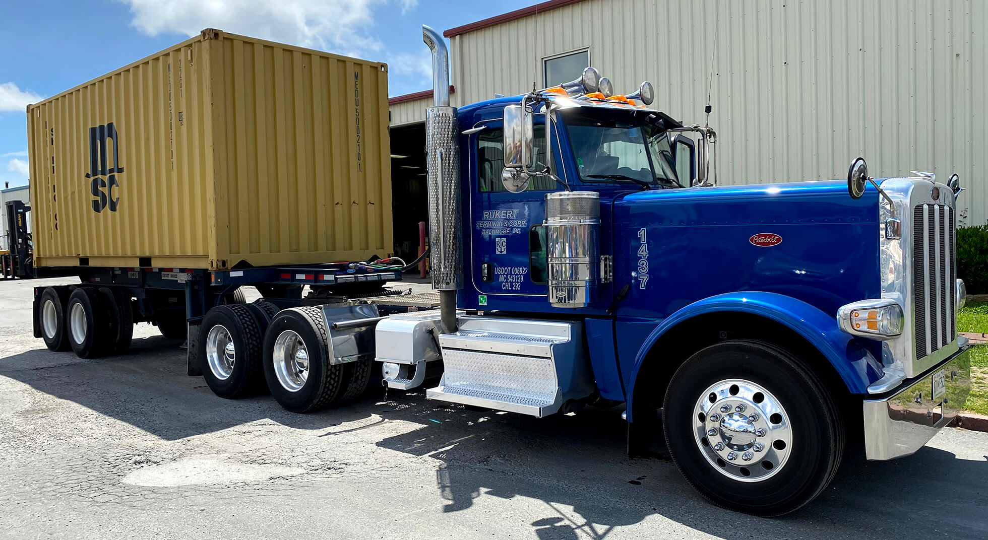 tractor trailer hooked to a container at rukert terminals baltimore